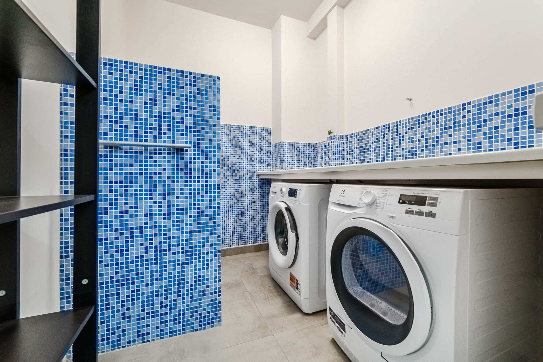 Modern Laundry Room with Washer & Dryer - Enjoy the Convenience of a Fully Functional Utility Area During Your Stay