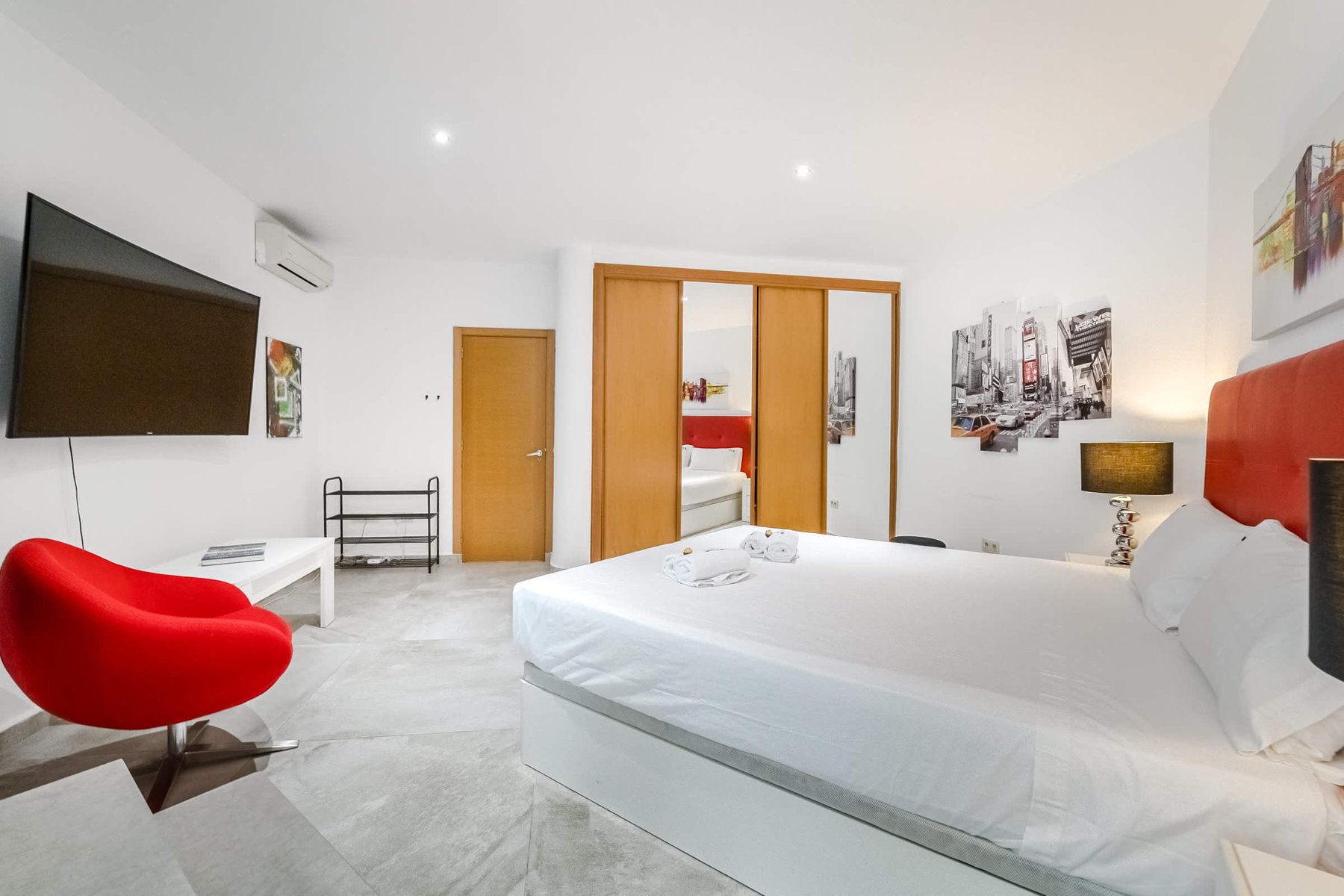 Spacious King Suite with Smart TV - Unwind in This Chic & Bright Room Featuring Sleek Decor and Ample Storage