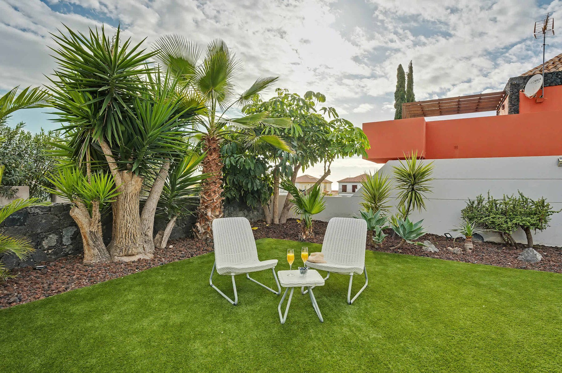 Tropical Garden Nook with Intimate Seating