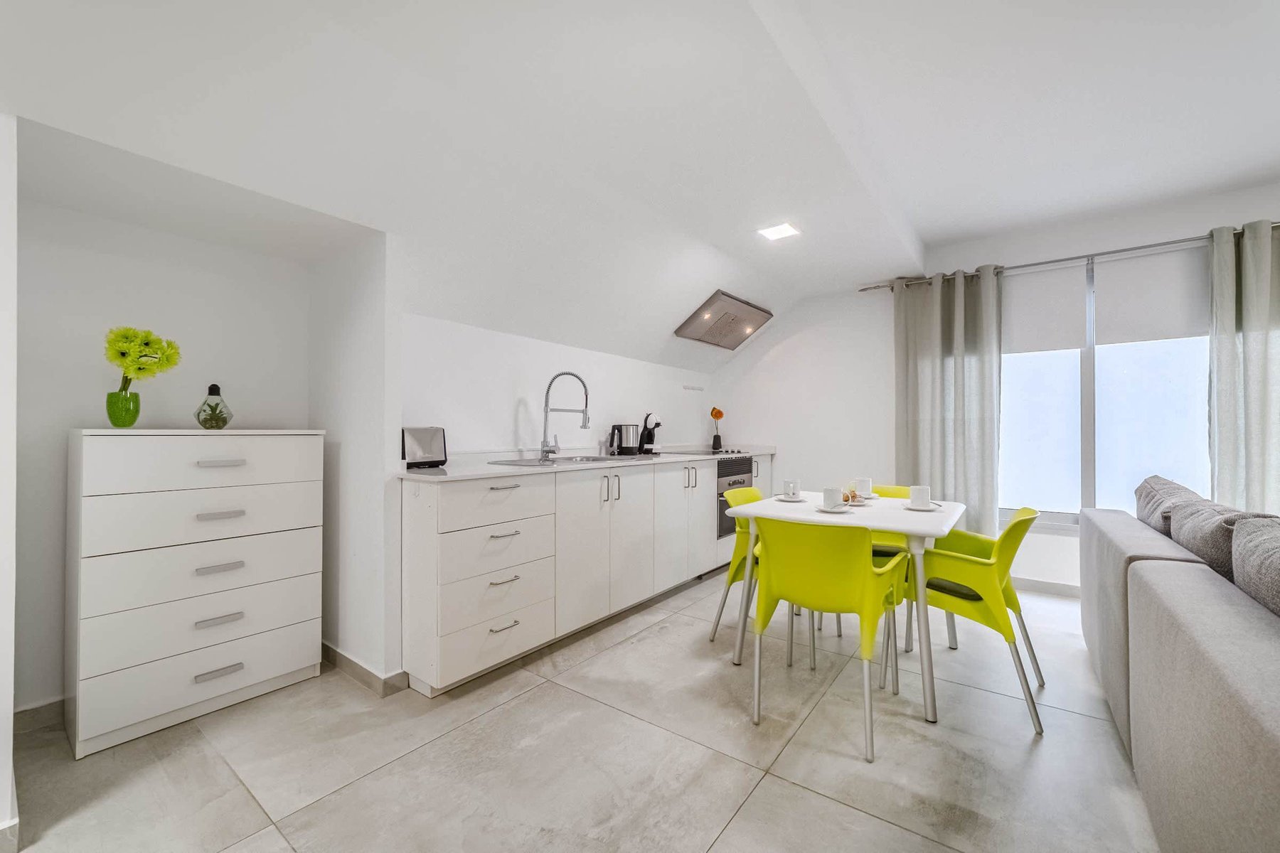 Open-Concept Lounge with Foosball & Kitchen  