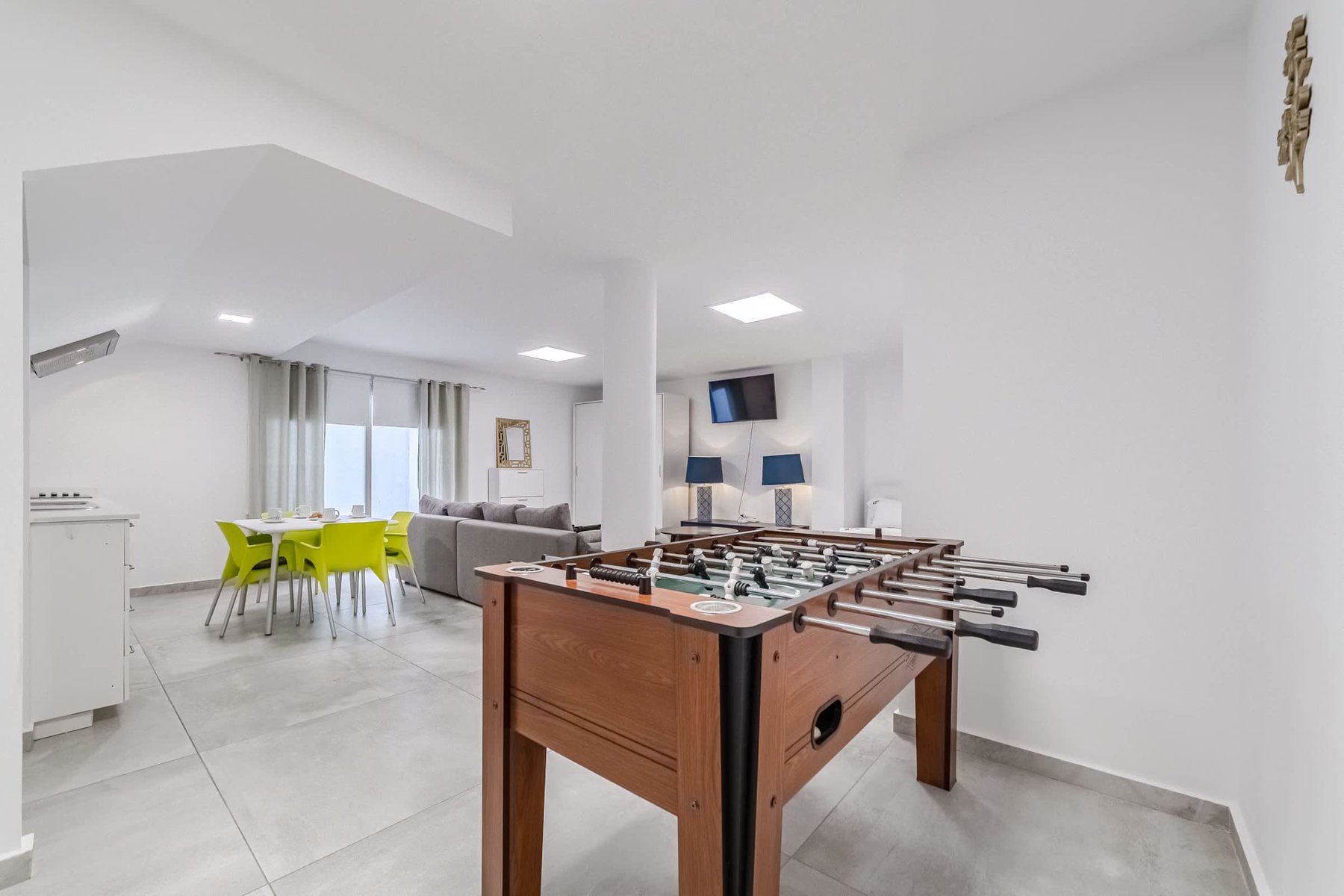 Open-Concept Lounge with Foosball & Kitchen  