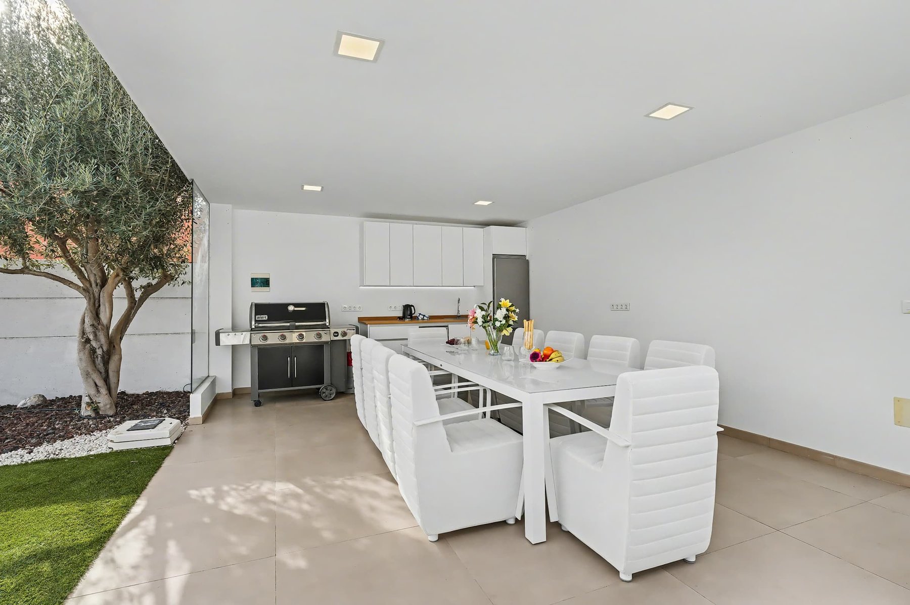 Gourmet Outdoor Kitchen with BBQ, Dining & Garden Views