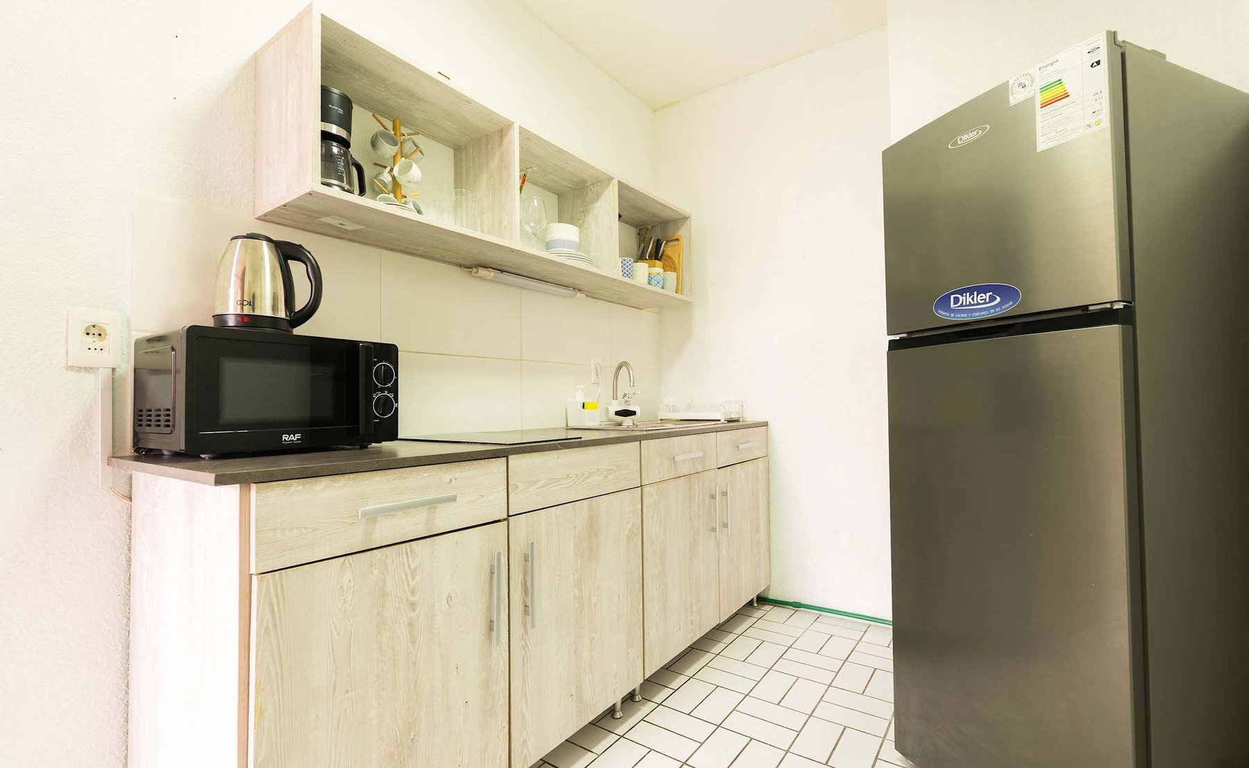 Galley Kitchen with Full Fridge