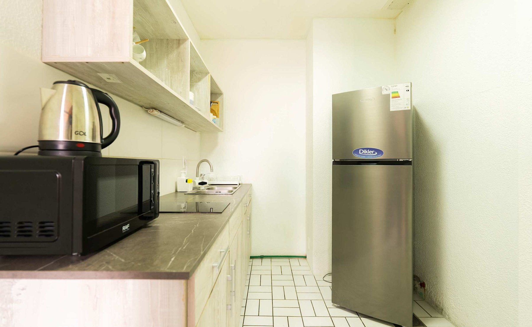 Kitchen with Fridge and Storage