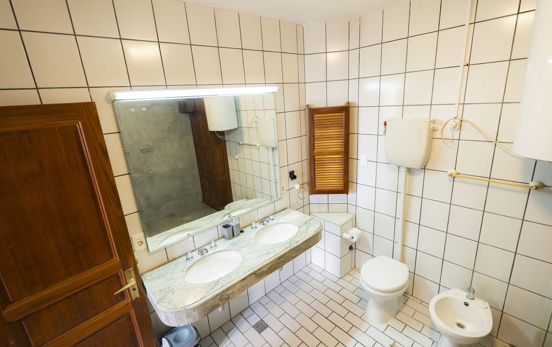 Bathroom with Twin Marble Basins