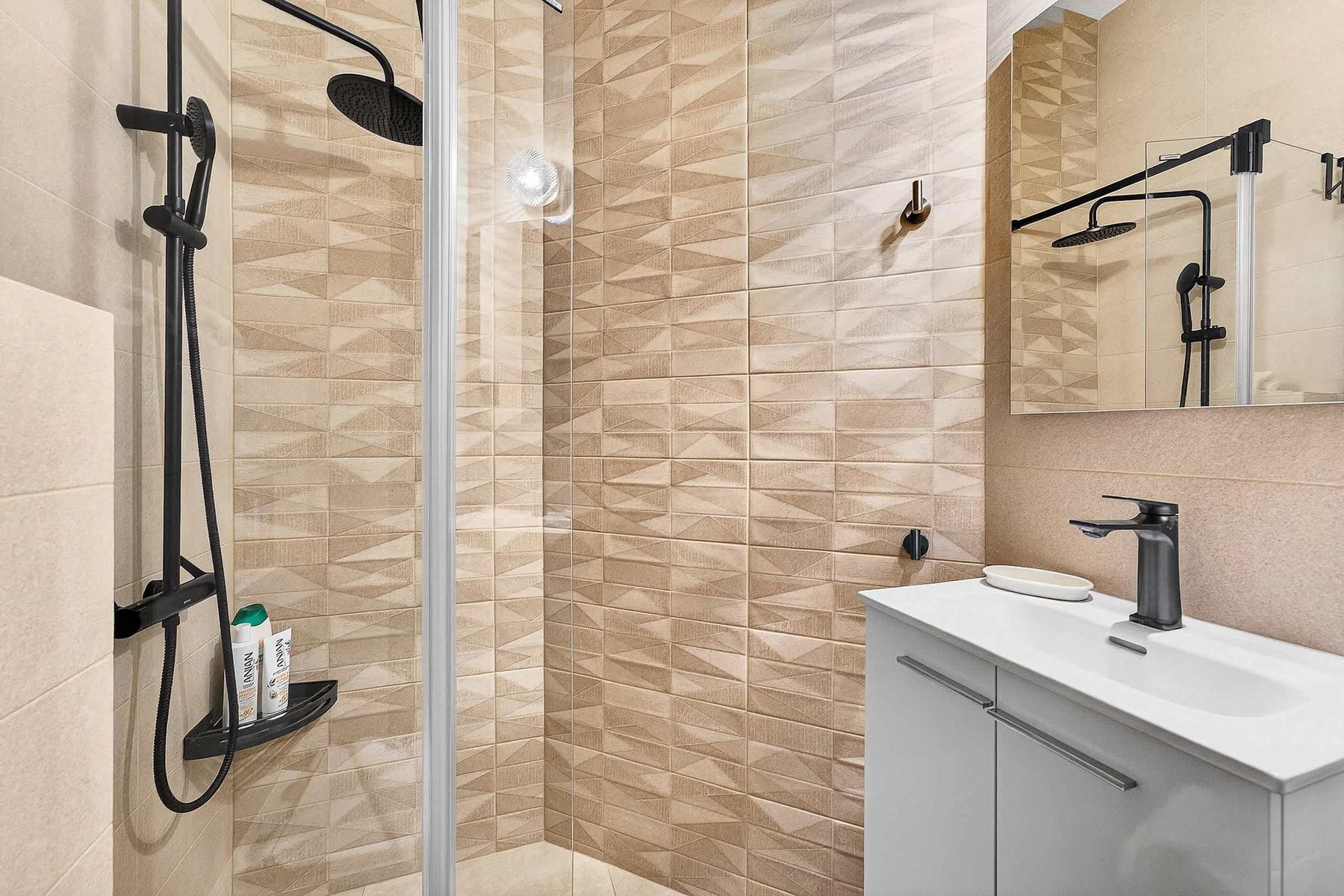 Second Bathroom with Shower, WC, Sink, and all Amenities