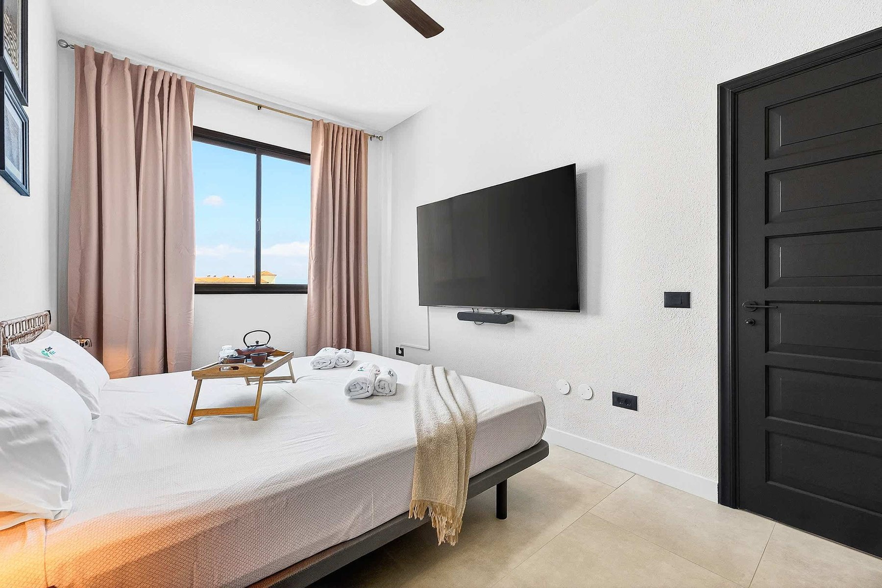 Master Bedroom with a King-Size Bed, Ocean Views, Wardrobes, En-Suite Bathroom and Multimedia TV & Sonos Sound System