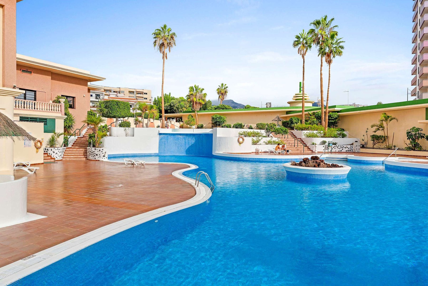 Resort-Style Swimming Pool with Sun Loungers