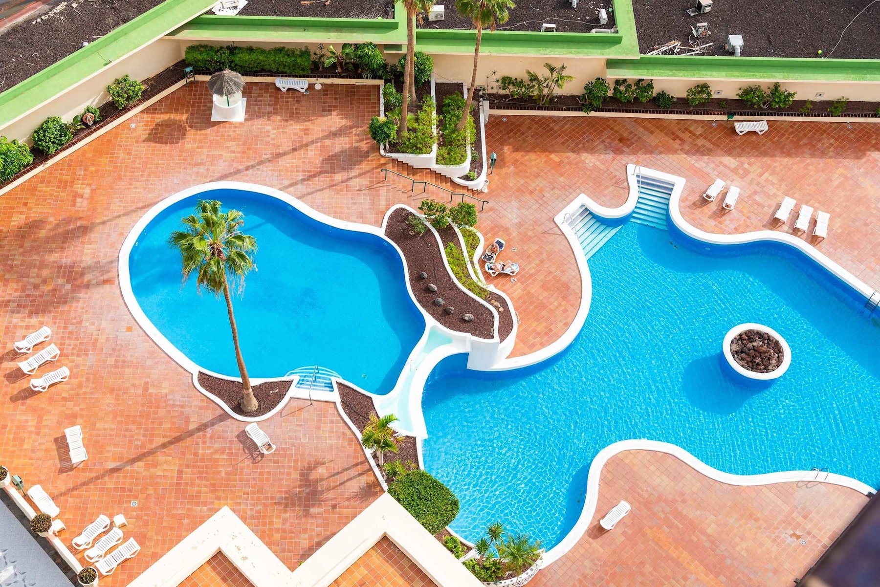 Resort-Style Swimming Pool with Sun Loungers & Palm Tree