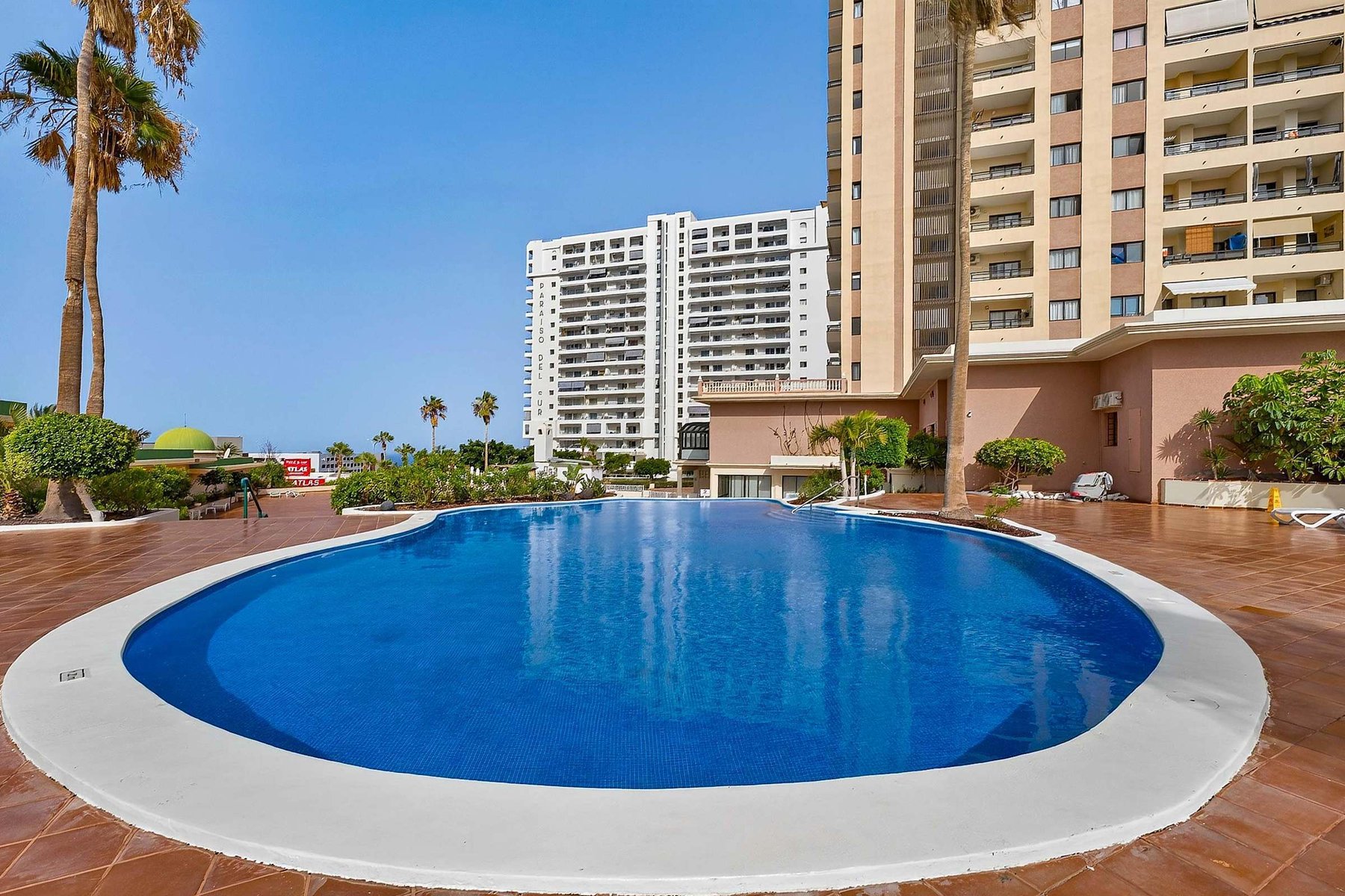 Resort-Style Swimming Pool with Sun Loungers