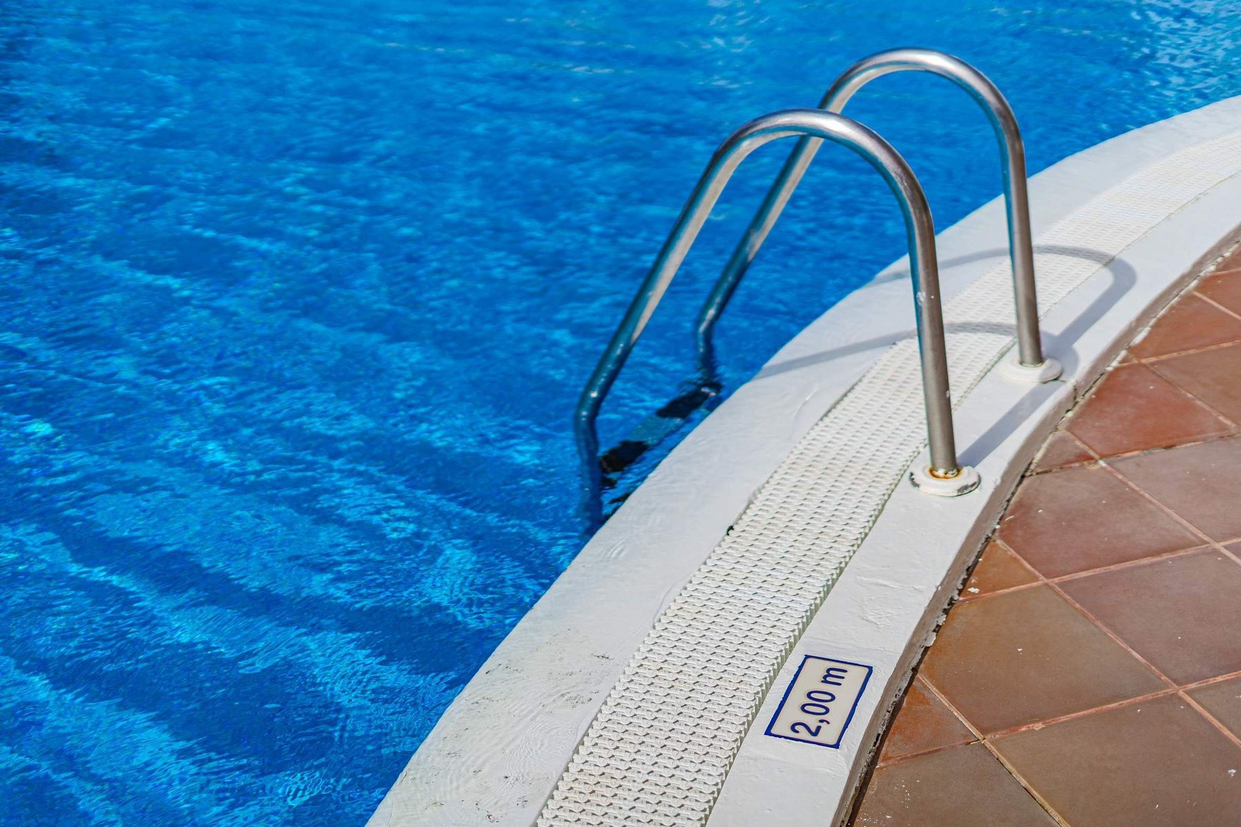 Resort-Style Swimming Pool with Sun Loungers