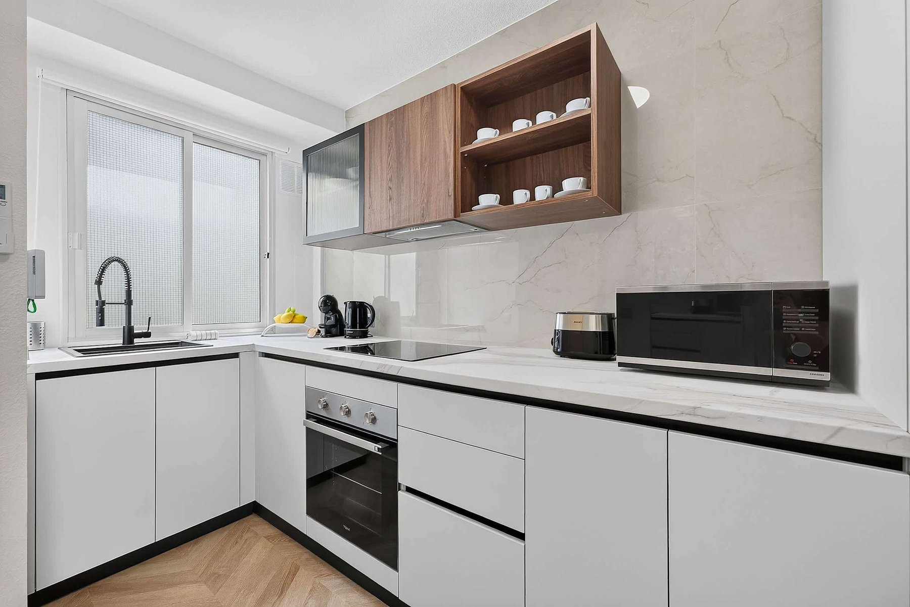 Minimalist Kitchen with Premium Finishes and Modern Appliances