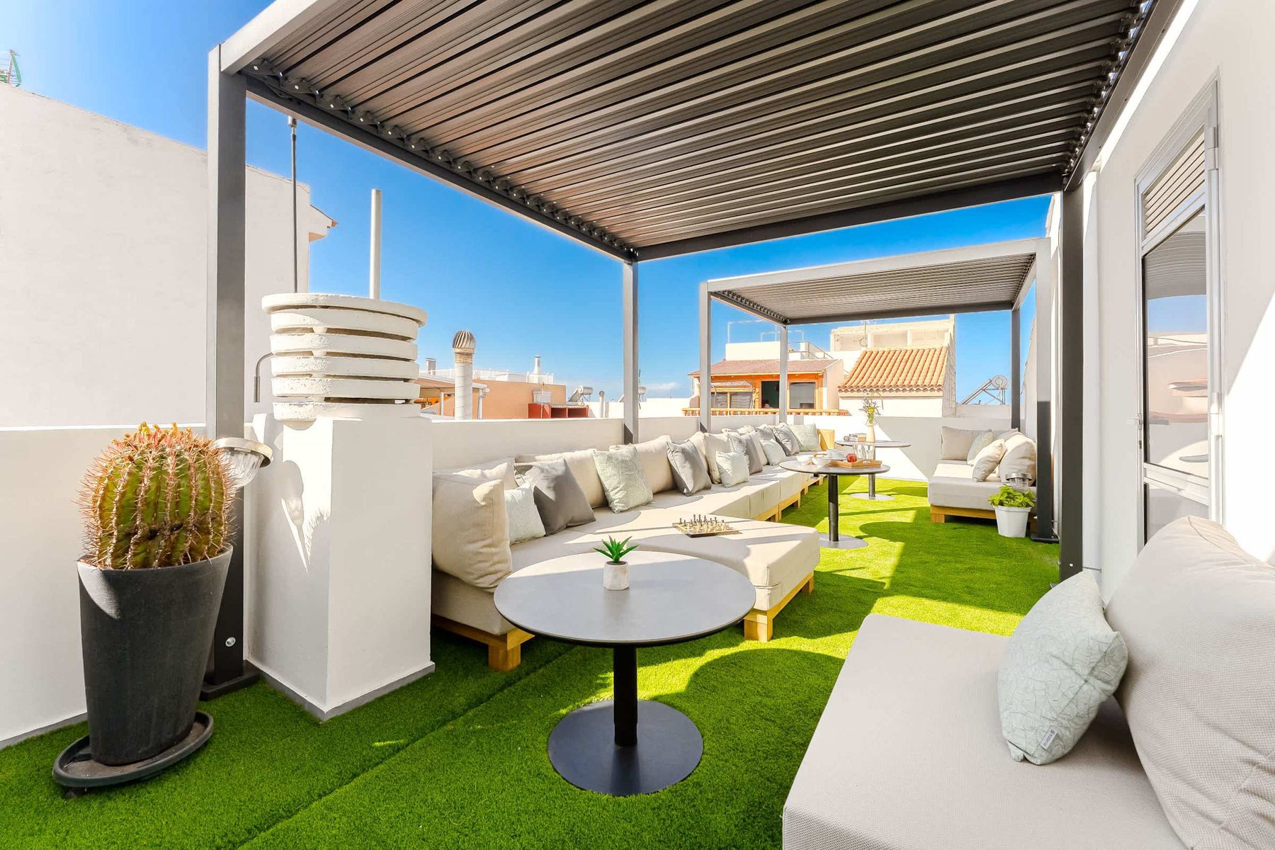 Shared Outdoor Lounge Space with Ocean Breeze and Modern Comfort