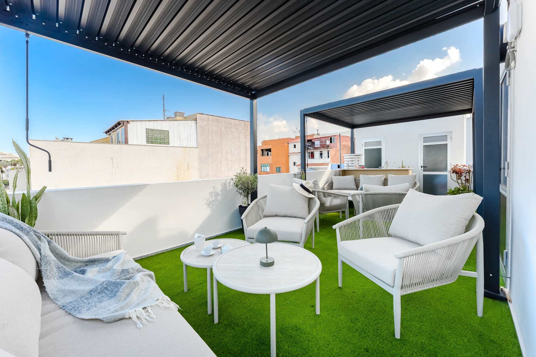 Shared Outdoor Lounge Space with Ocean Breeze and Modern Comfort