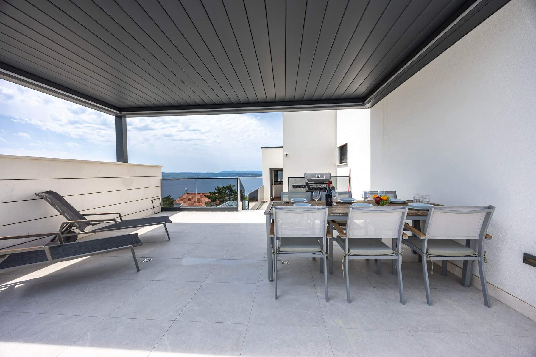 Covered Outdoor Dining & Sun Loungers