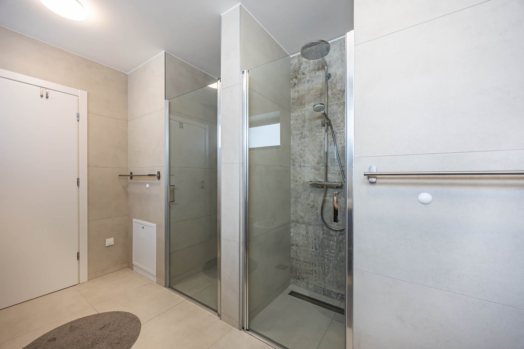 Two Walk-In Showers in the Upper Bathroom
