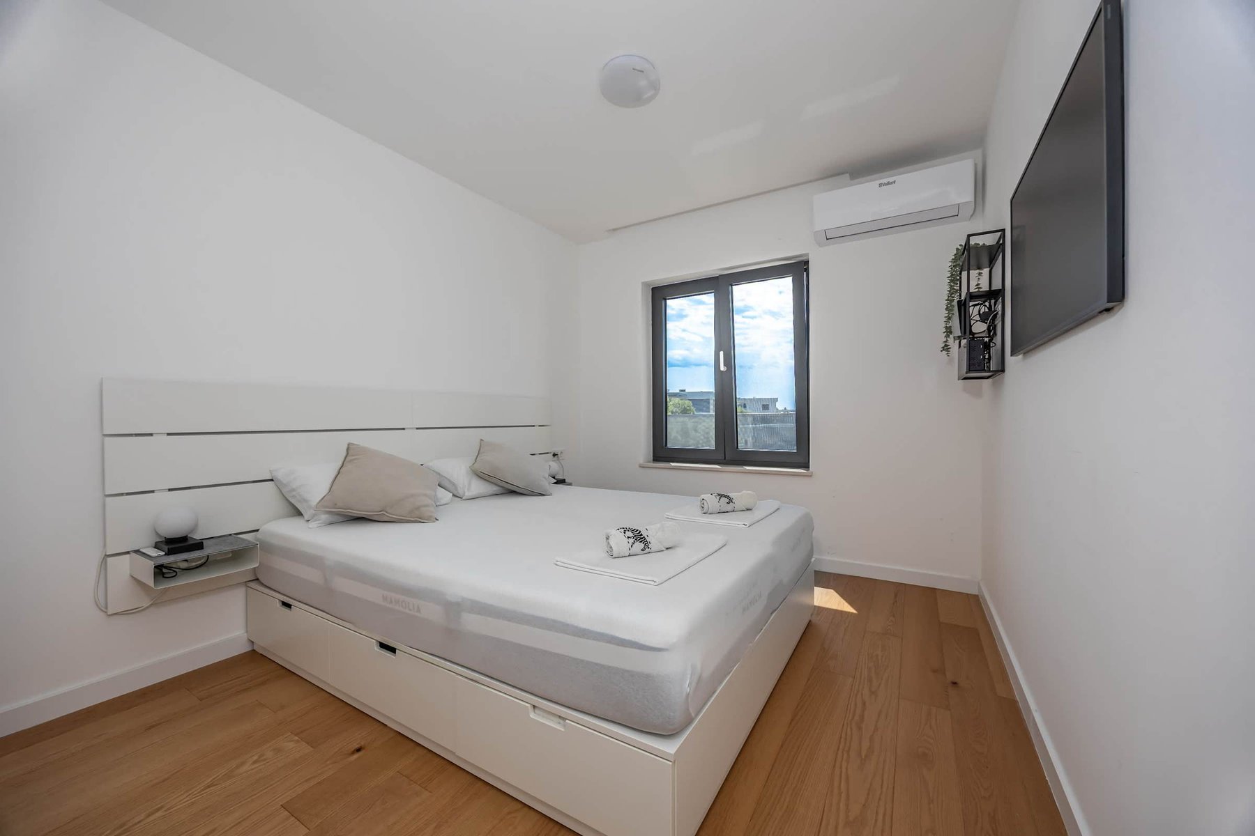 Ground-Level Bedroom with Queen Bed & TV