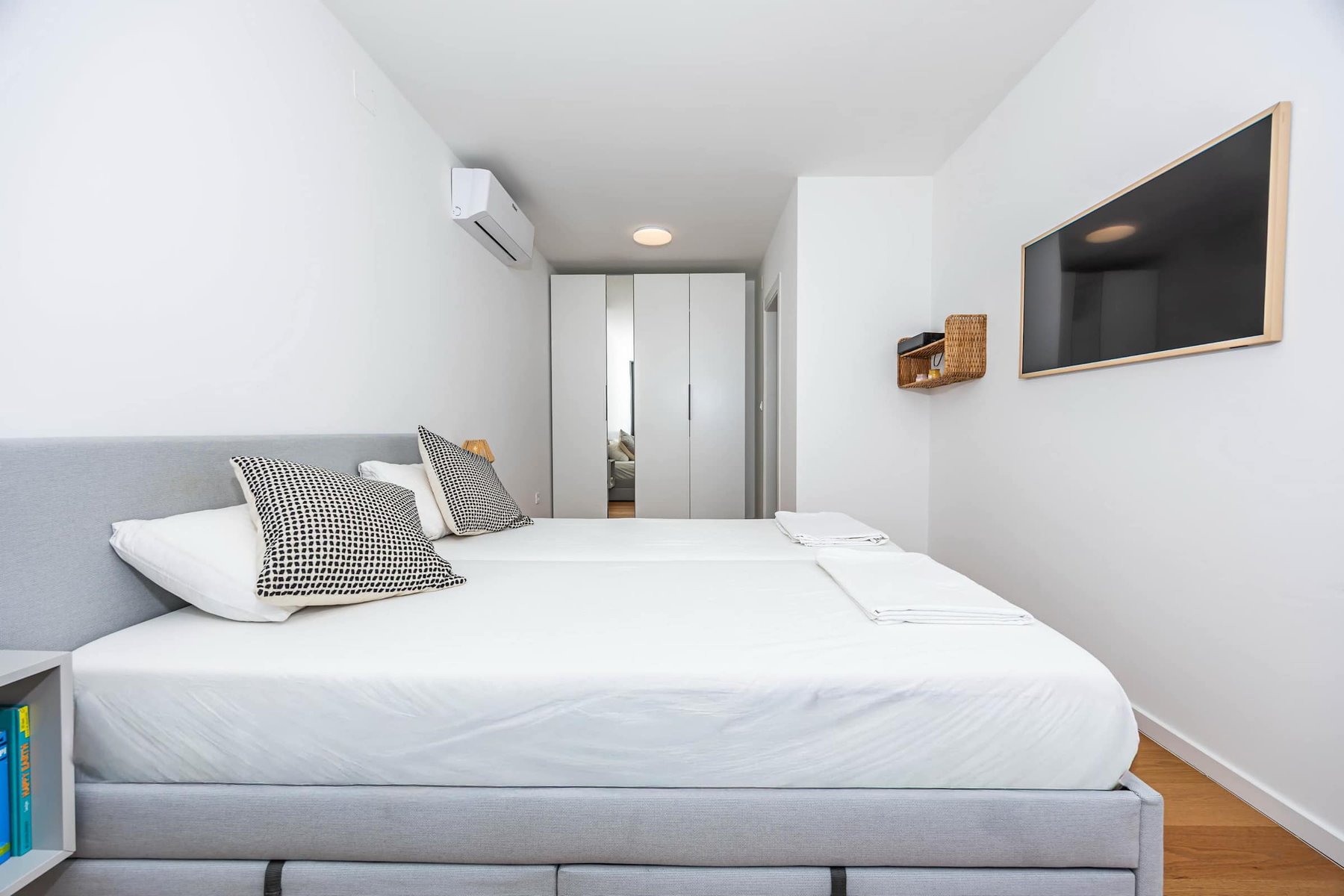 Bedroom 2: queen bed and wardrobe