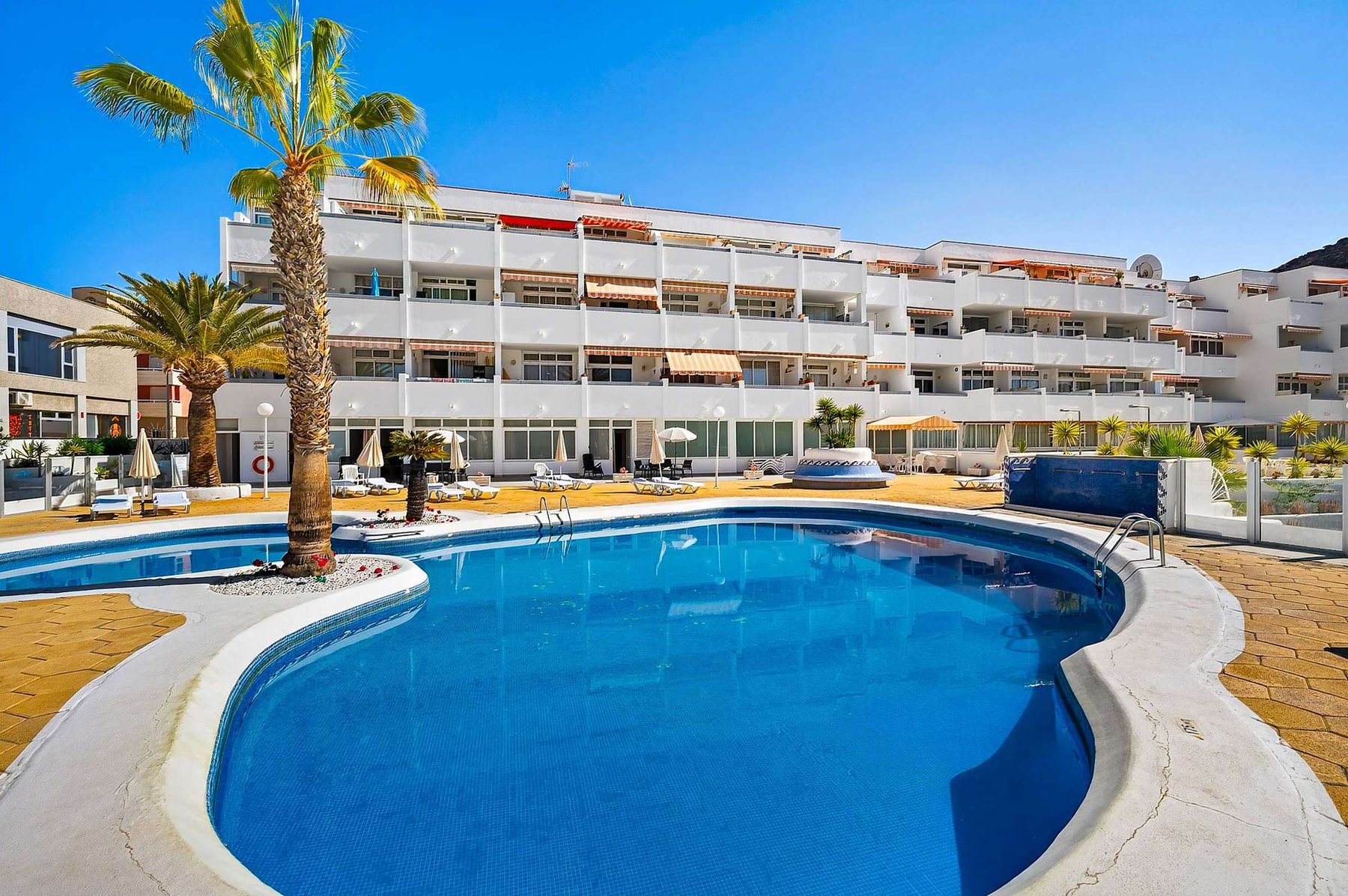 Two Connected Pools & Sun Terrace