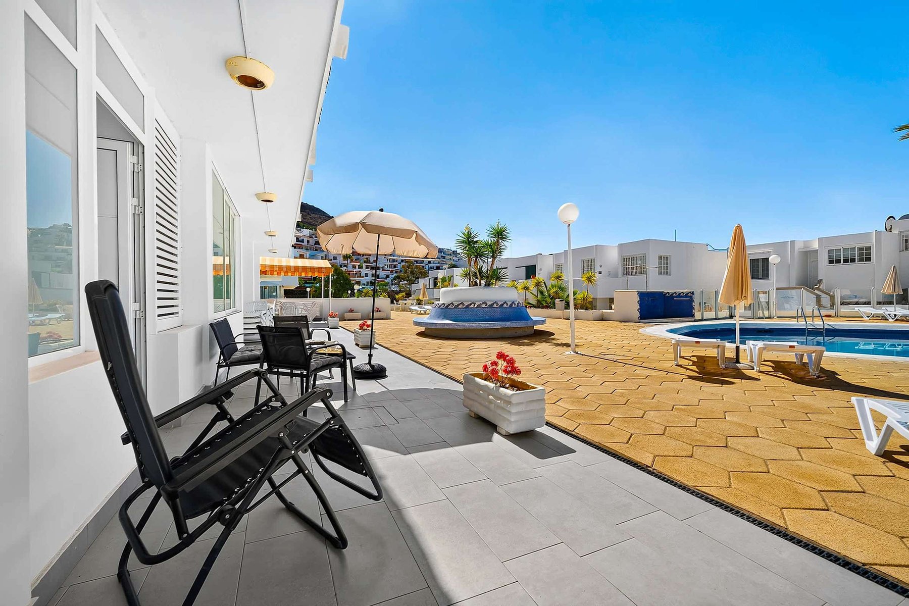 Terrace with Sun Loungers & Pool