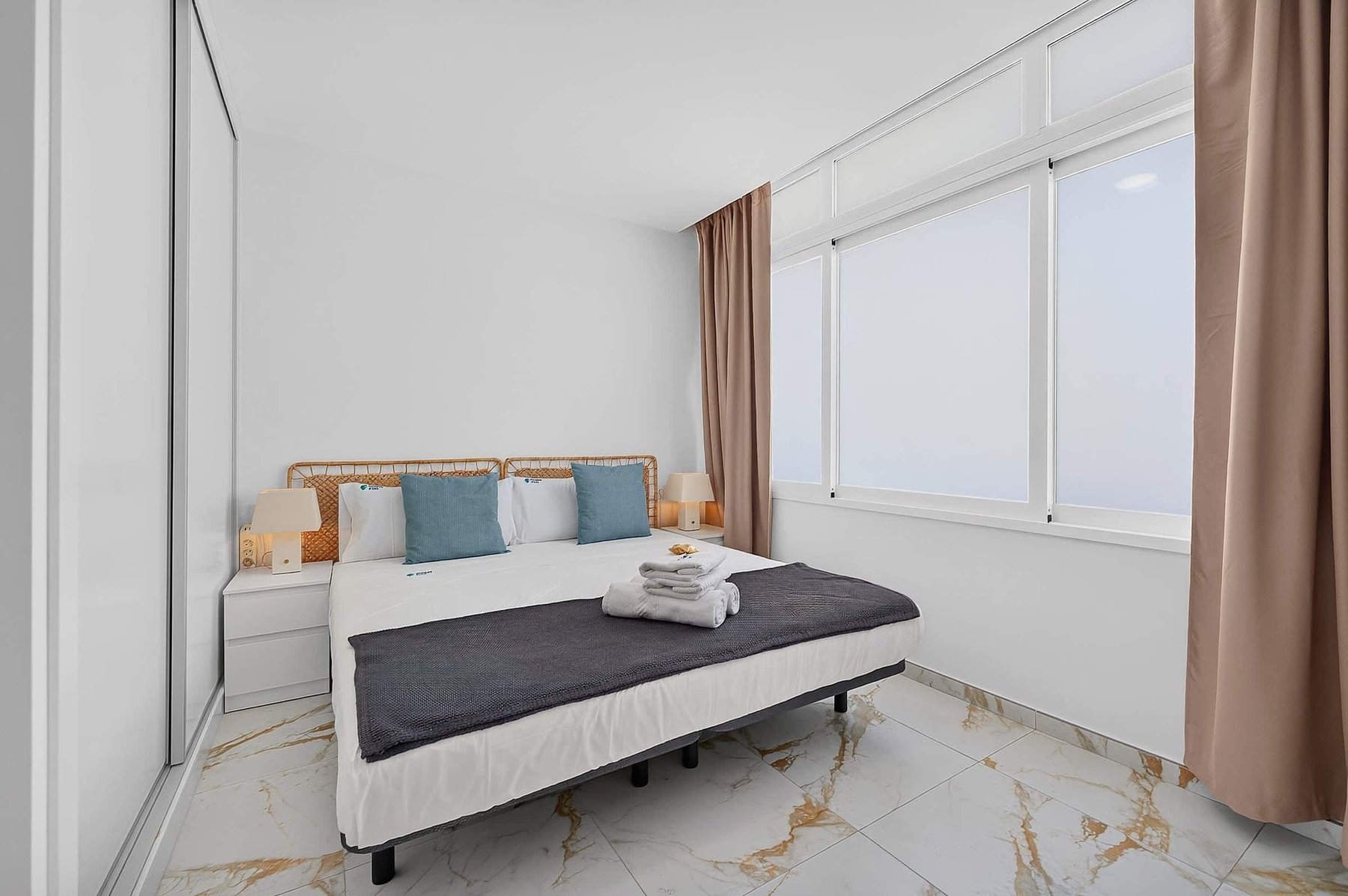 Bright Queen Bedroom with Large Window