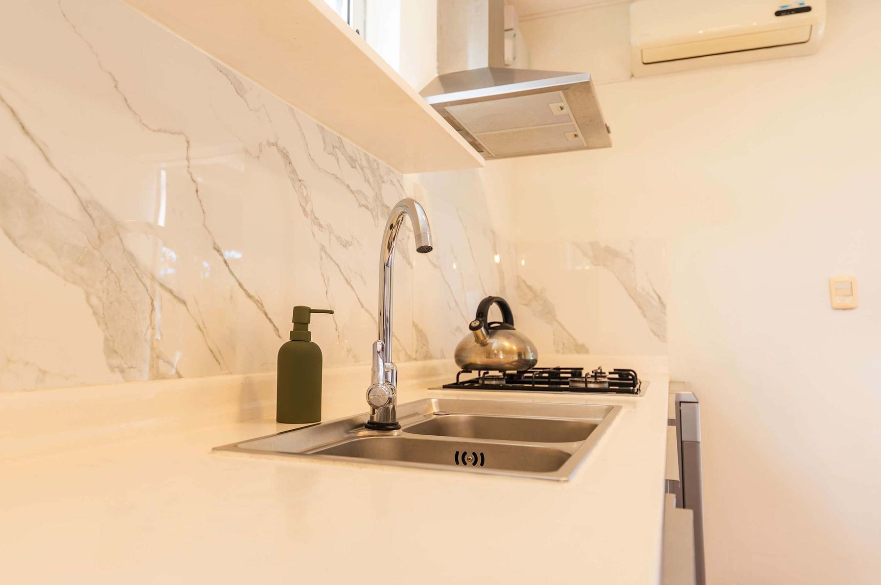Kitchen Counter with Marble Backsplash