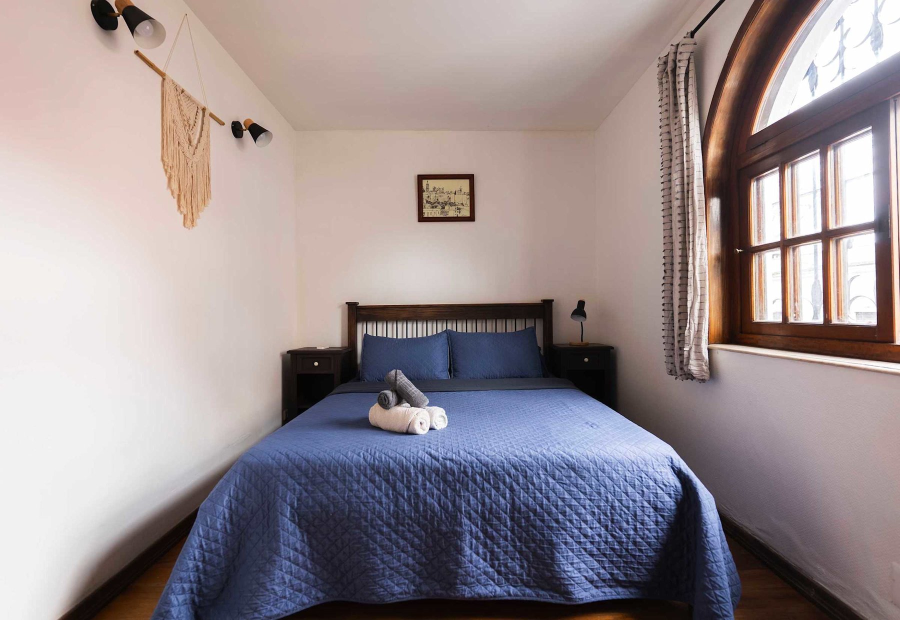 Bedroom with Arched Window