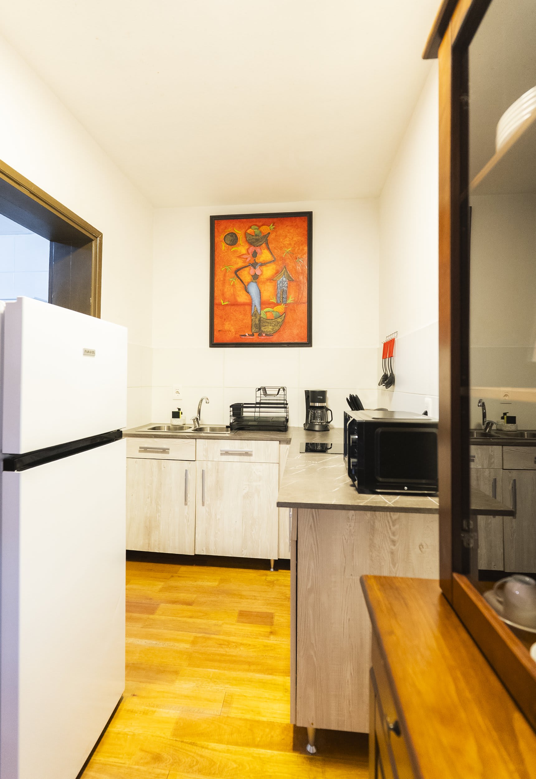 Kitchen Corner with Orange Painting