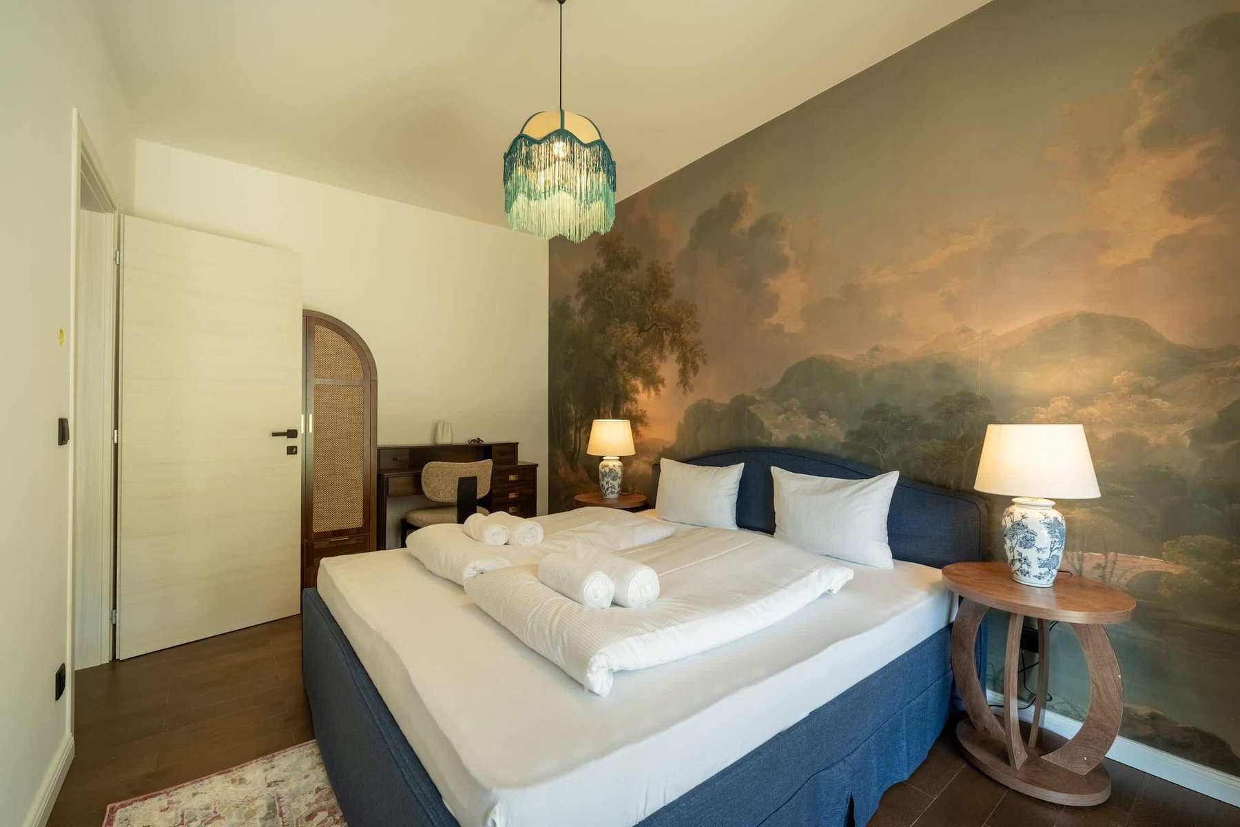Bedroom with landscape mural