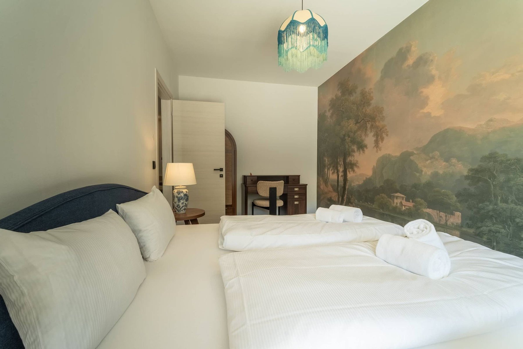 Bedroom with landscape mural