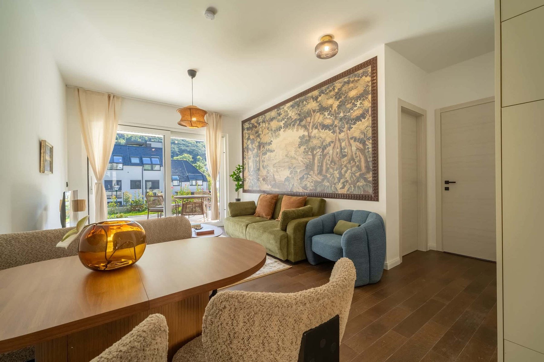 Dining table with the living room beyond