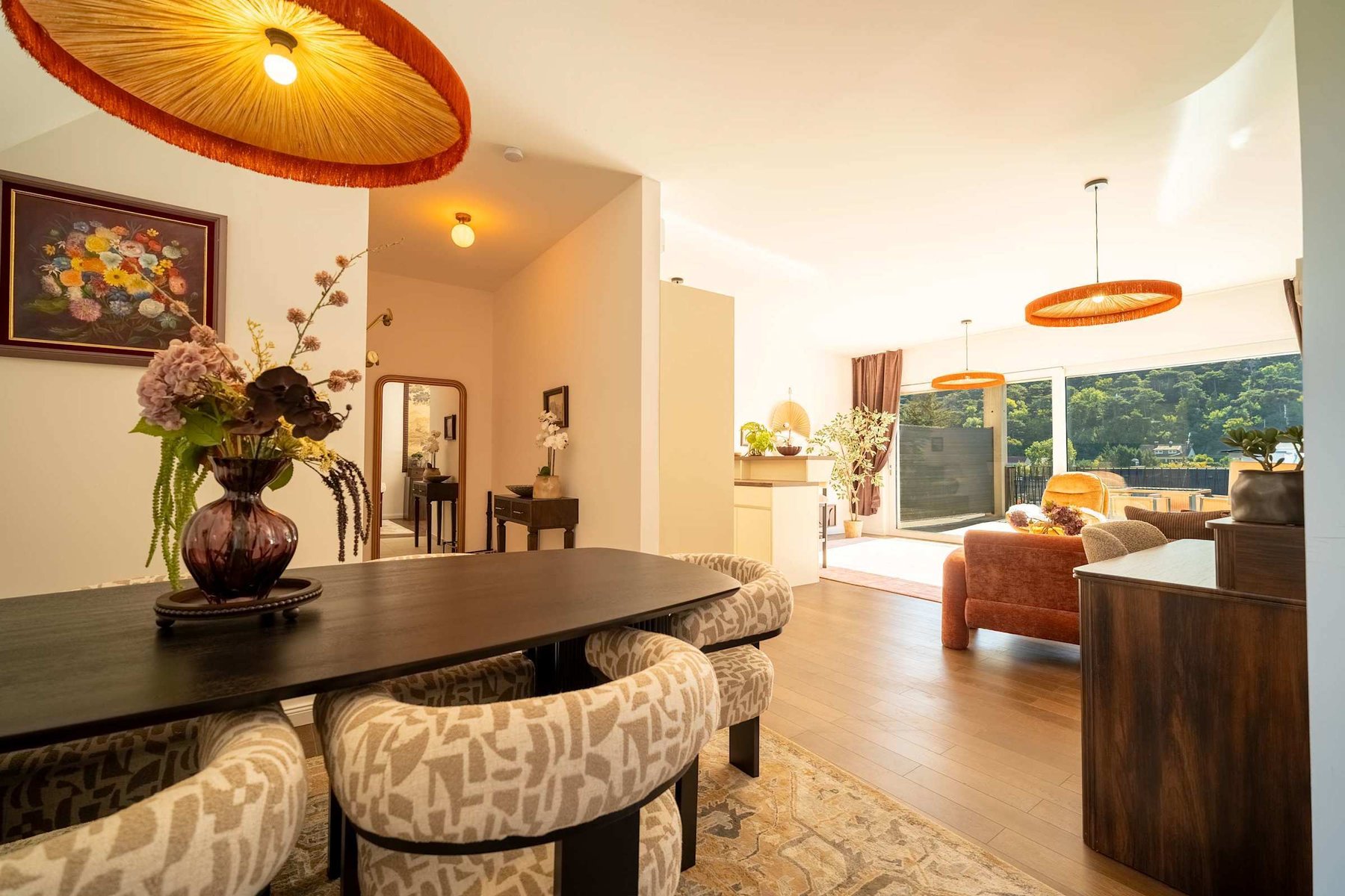 Dining table with the living room beyond